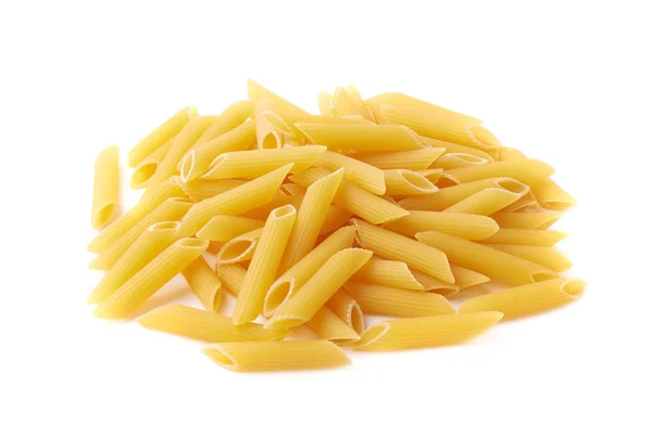 Kuru sarı penne makarna yığını — Stok fotoğraf