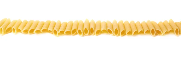 Massa de penne amarela seca múltipla — Fotografia de Stock