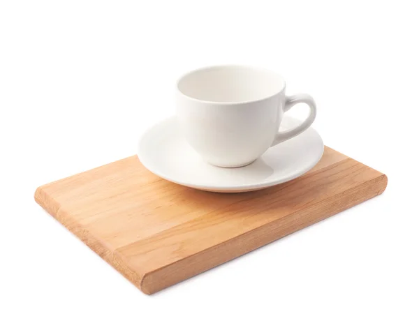 Leere Tasse auf einem Holzbrett — Stockfoto