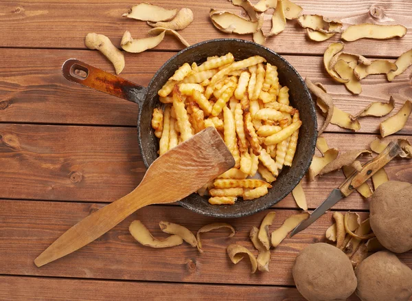 Cooking fried french potatoes — Stock Image Cooking fried french potatoes Stock Image