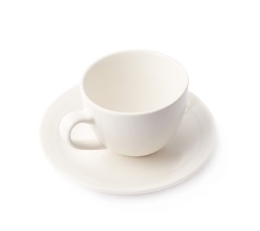 Bir plaka üzerinde beyaz seramik kupa