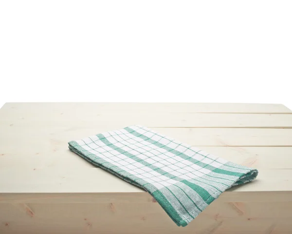 Towel over the wooden table — Stock Photo, Image