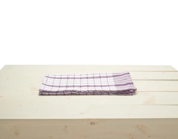 Towel over the wooden table — Stock Photo, Image