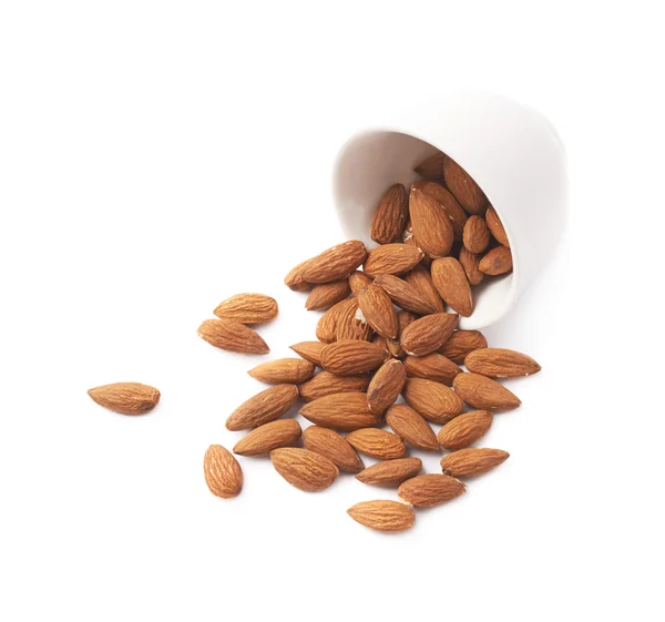 Cup full of almond seeds — Stock Photo, Image
