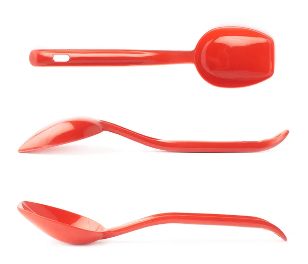 Red plastic kitchen scoops — Stock Photo, Image