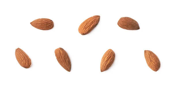 Set of seven almond seeds — Stock Photo, Image