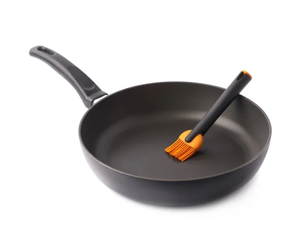 Brosse à huile de silicone dans une casserole — Photo