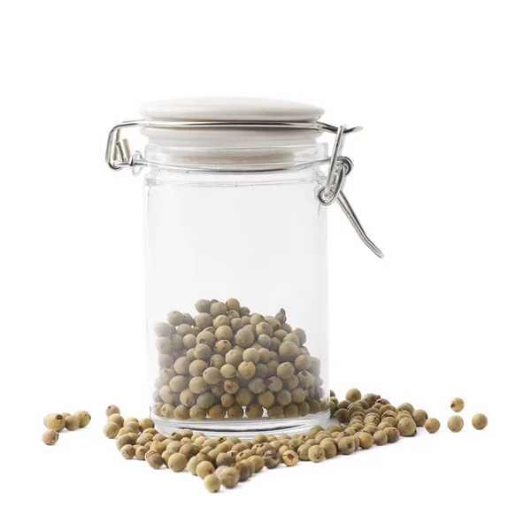 Glass jar filled with green peppercorn — Stock Photo, Image