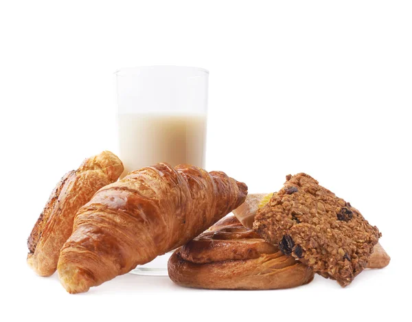 Vaso de leche y bollos de pastelería — Foto de Stock