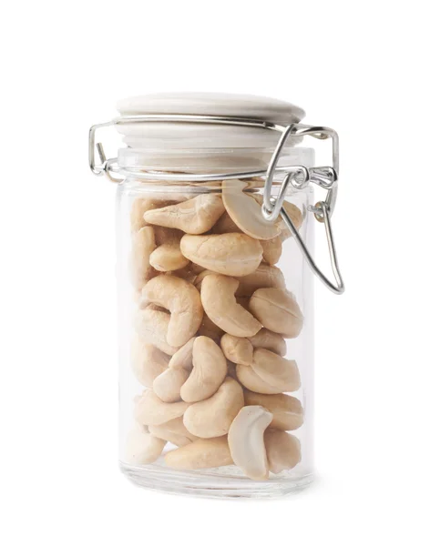 Glass jar filled with the cashew nuts — Stock Photo, Image