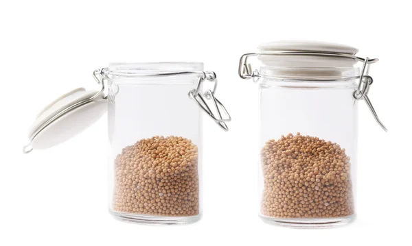 Glass jars filled with mustard seeds — Stock Photo, Image
