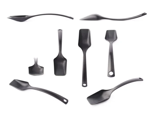 Black plastic kitchen scoop — Stock Photo, Image