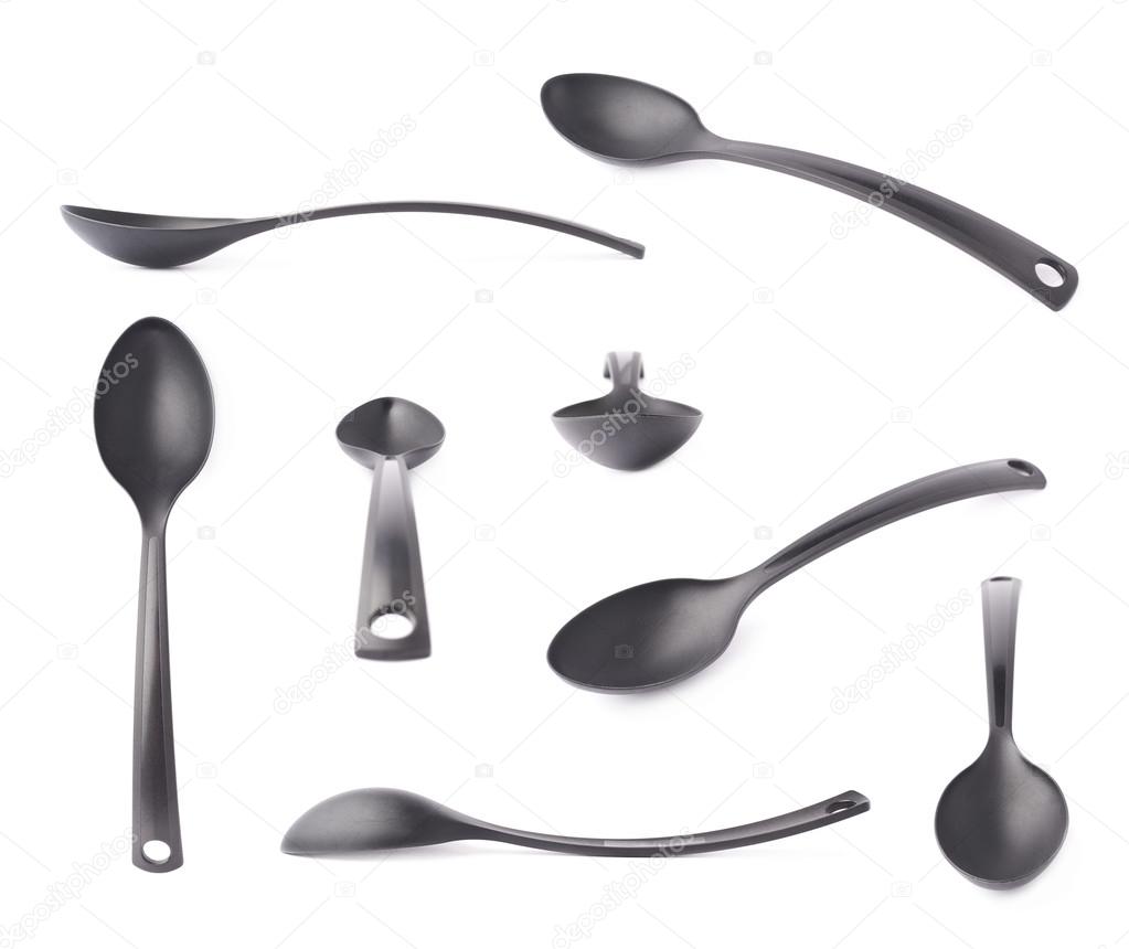 Black plastic kitchen ladle spoons — Stock Photo © exopixel 76884729