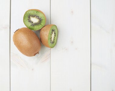 Two sliced kiwifruits clipart