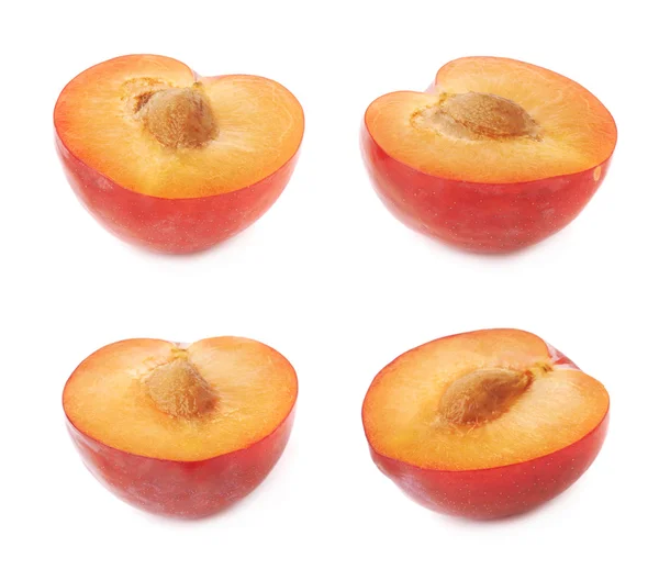 Cut open plums halfs — Stock Photo, Image