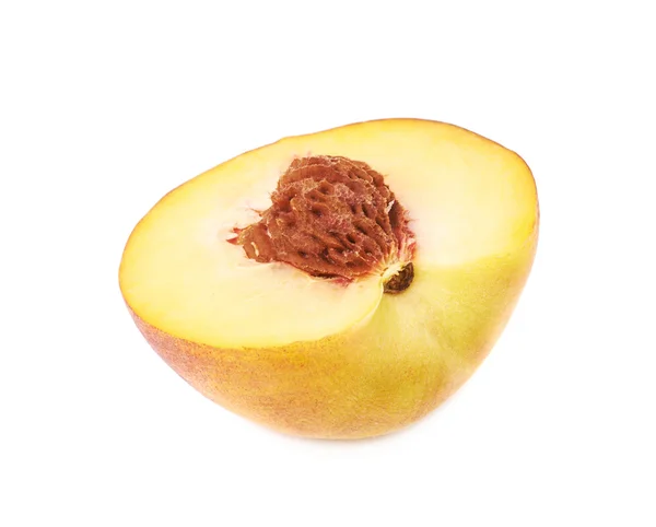 La mitad de una fruta de melocotón — Foto de Stock