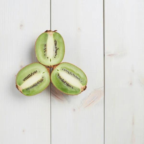 Three kiwifruit halves — Stock Photo, Image