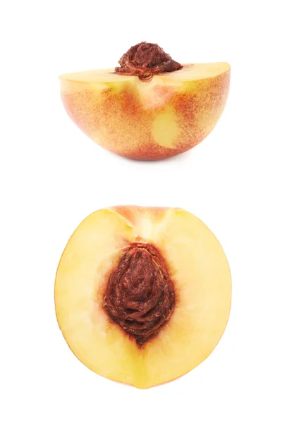 Cut open nectarine half isolated — Stock Photo, Image