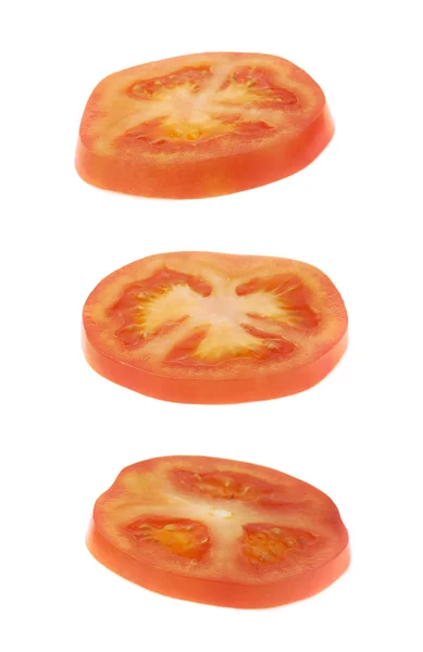 Trozos de sección transversal de tomate aislados — Foto de Stock