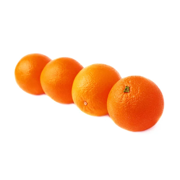 Четыре апельсина — стоковое фото