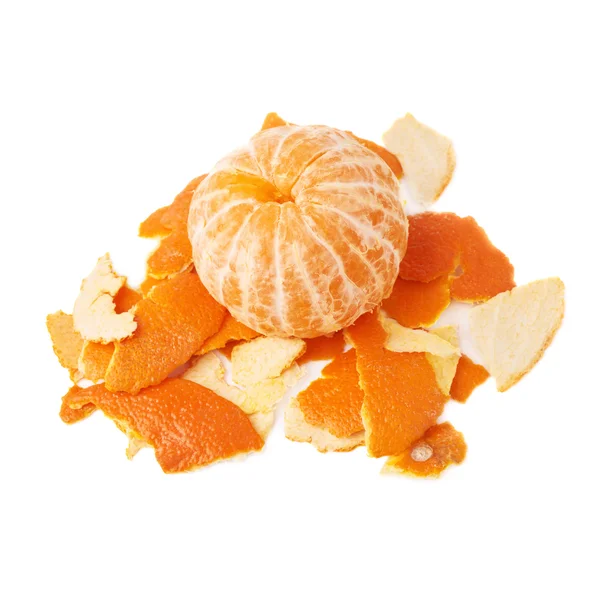 Tangerine on a pile of it's peel — Stock Photo, Image