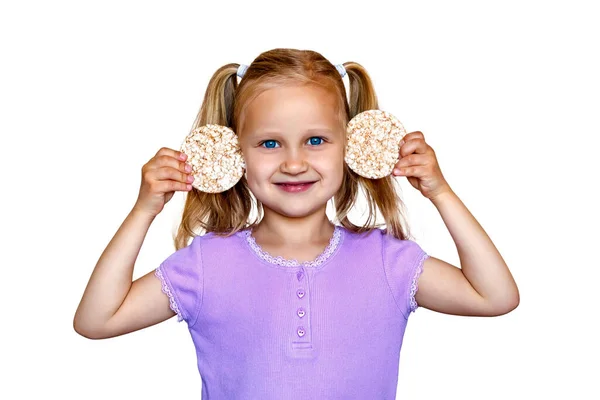 Little Girl Holding Rice Cookies Her Ears Child White Background — Fotografia de Stock