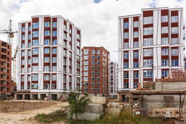 Building construction in the city. Construction site high rise buildings.