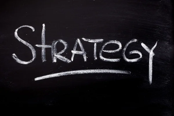 Strategy handwritten with white — Stock Photo, Image