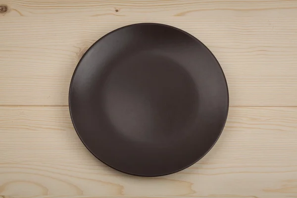 Black empty plate — Stock Photo, Image