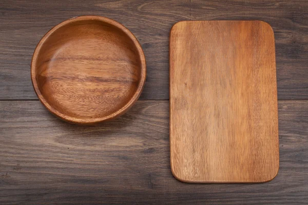 Wooden dish, spoon, desk on table