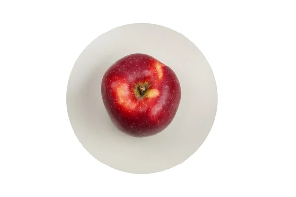 Assiette blanche avec pomme — Photo