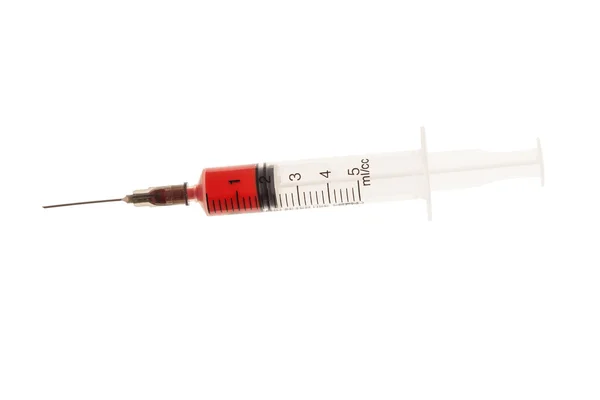 Syringe with blood — Stock Photo, Image