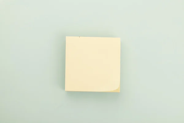 Sticky paper, isolated on gray — Stock Photo, Image