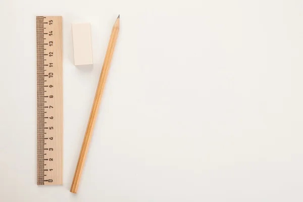 Achtergrond van het papier met potlood, Gum en regel — Stockfoto