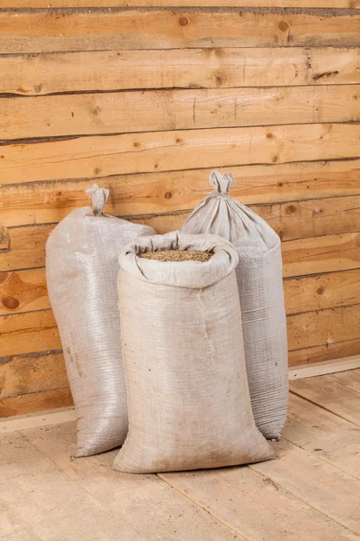 Oat grains in sack bags Stock Image