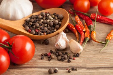 variety of red tomatoes on table
