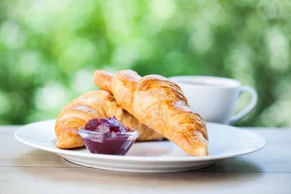 Croissants, coffee and  jam — Stock Photo, Image