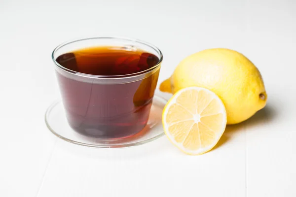 Taza de té con limón —  Fotos de Stock