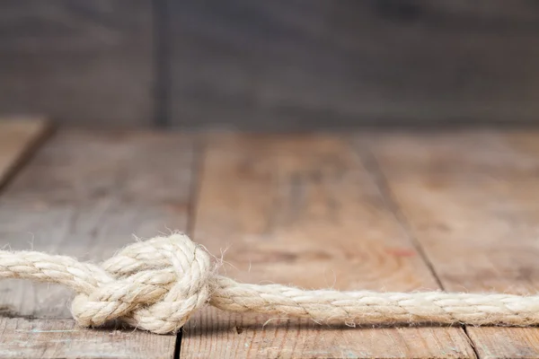 Old frayed rope tied in a bundle — Stock Photo, Image