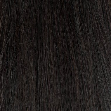 Mankenin üzerinde insan saçı peruğu. Arkadan bak. Esmer. Düz saç