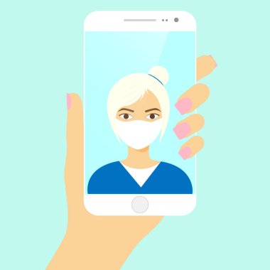 Koruyucu tıbbi maskeli doktor bir video çağrısı yaptı.