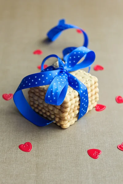 Cookies with blue ribbon — Stock Photo, Image