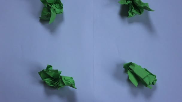 Stop motion green paper opening — Stock Video