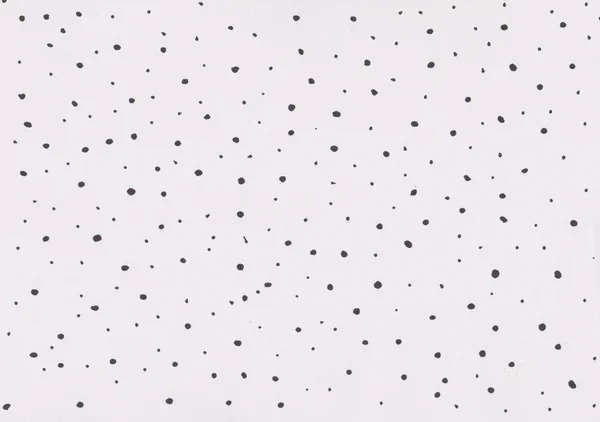 Puntos negros sobre la textura del papel — Foto de Stock