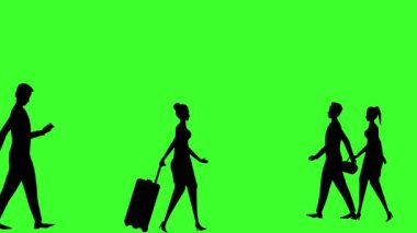 Yeşil ekranda yürüyen insanların siluetleri