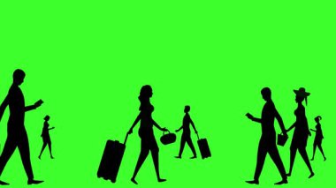 Yeşil ekranda yürüyen insanların siluetleri