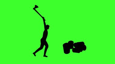 Çatlak baltayla çalışan siluet adam ahşap yeşil ekran kesiyor.