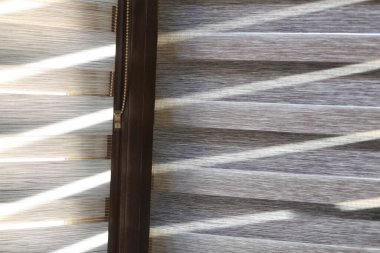 interior blinds on the window, with natural light entering the house, background