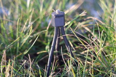 Mini esnek bir kamera tripodu, fotoğrafçılar ya da film yapımcıları ekipmanı.