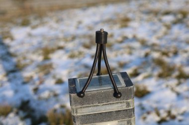 Mini esnek bir kamera tripodu, fotoğrafçılar ya da film yapımcıları ekipmanı.